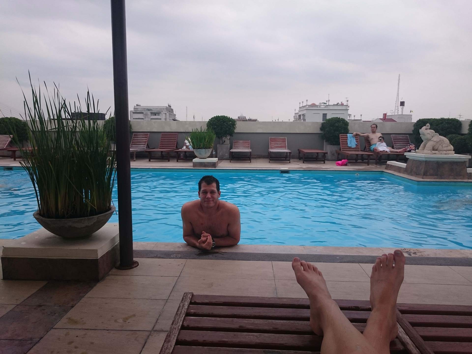 Swimming on our first day in Bangkok at Rambuttri Village Inn